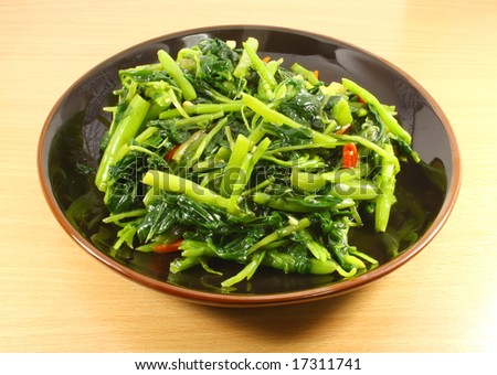 Single Serving of Chinese Vegetables on a Black Plate