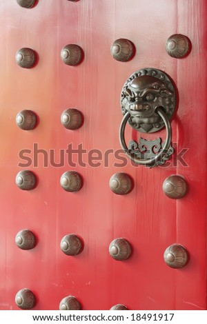 Red Chinese Traditional Door With Lion Guardian