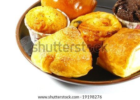 Assorted Pastries and Cakes On a White Surface Background