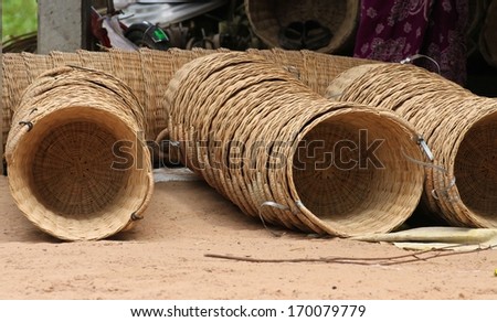 Hand woven baskets stacked together.