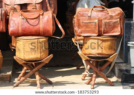 NEGOMBO, SRI LANKA - FEBRUARY 13: Traditional handcrafted leather goods for sale in a shop in the main street of Negombo, Sri Lanka on the 13th February, 2014.