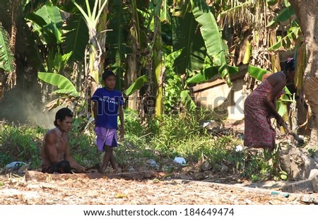 PHANG NGA, THAILAND - MARCH 11: Moken sea gypsy village and its inhabitants going about daily life on Koh Surin Tai in the Surin Islands National Park, Phang Nga, Thailand on the 11th March, 2014.