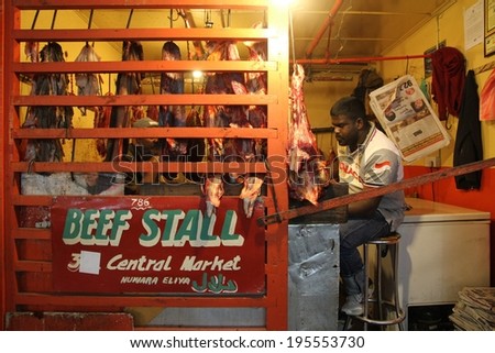 NUWARA ELIYA, SRI LANKA - FEBRUARY 19th: A traditional butcher\'s shop in the market place of Nuwara Eliya, Sri Lanka on the 19th February, 2014.