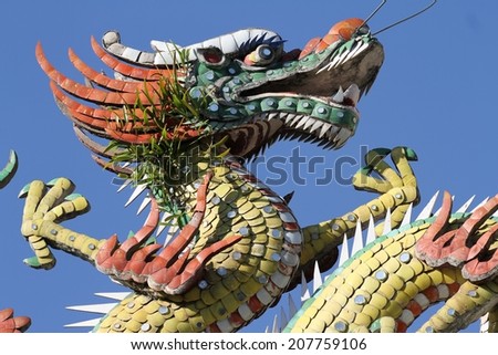 GEORGE TOWN, MALAYSIA - MAY 31: Intricate art adornment of the roof of the Hainan Temple in Georgetown, Malaysia on the 31st May, 2014.