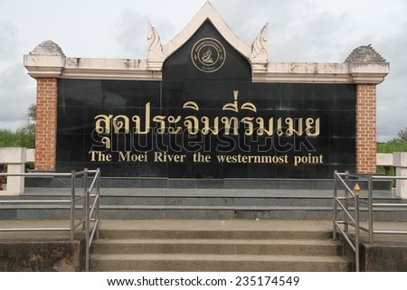 MAE SOT, THAILAND - SEPTEMBER 2: The Moei River Western Most Point sign at the border crossing into Myanmar from Thailand in the town of Mae Sot, Thailand on the 2nd September, 2014.