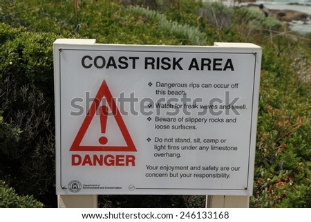 PERTH, AUSTRALIA - JANUARY 1: Coast Risk Area sign at Redgate Beach, Margaret River south of Perth, Australia on the 1st January, 2015.