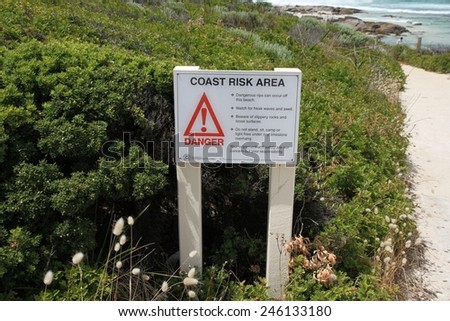 PERTH, AUSTRALIA - JANUARY 1: Coast Risk Area sign at Redgate Beach, Margaret River south of Perth, Australia on the 1st January, 2015.