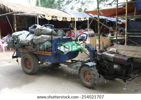 A funny looking tractor vehicle used for carrying goods in the northern remote town of Bhamo, Myanmar.