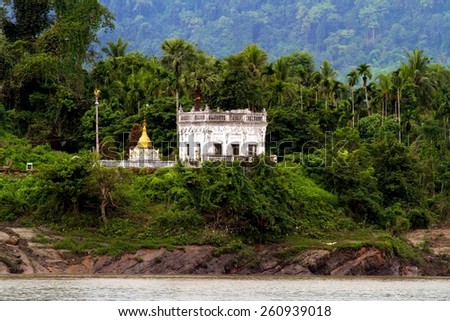 One of the many Buddhist temple compounds that line the banks of the Irrawaddy River near Mandalay, Myanmar.