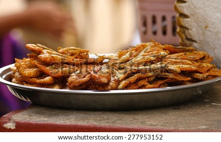Crispy jumbo shrimp or prawns in batter, a local dish in Myanmar.