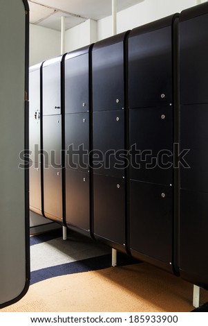 Black wood locker room at office.