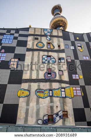 VIENNA, AUSTRIA - JULY 18,  2014: The District heating plant in Vienna designed by the famous Austrian architect Friedensreich Hundertwasser. Wide-angle view.