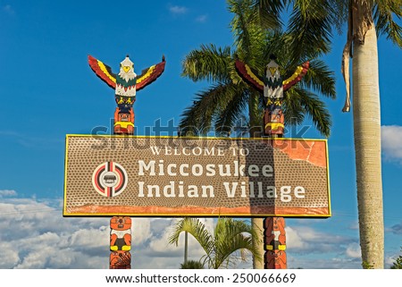 MIAMI, FLORIDA - JANUARY 13, 2015 : Entrance sign in the Miccosukee Indian Village. The Miccosukee Tribe is a federally recognized Indian Tribe residing in the Florida Everglades west of Miami.