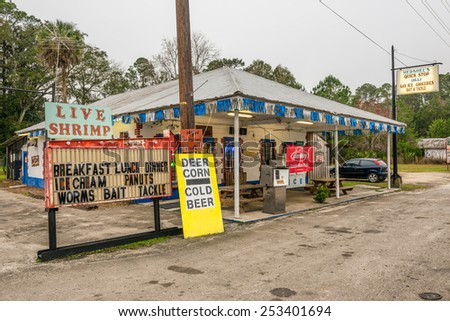 OTTER CREEK, FLORIDA - JANUARY 15, 2015 : Vintage gas pump and a general store on US Highway 19, near Cedar Key, Florida