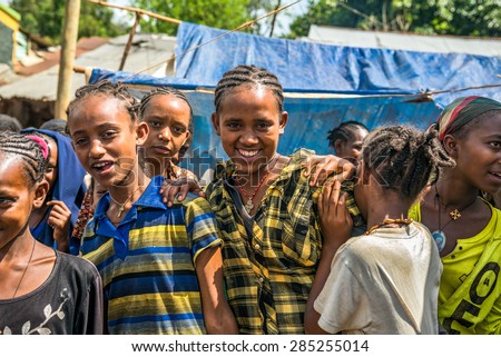 JIMMA, ETHIOPIA - MAY 2, 2015 : Young ethiopian girls at a popular local market  in Jimma.