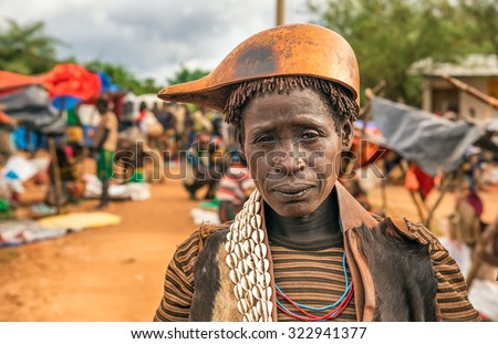 TURMI, OMO VALLEY, ETHIOPIA - MAY 5, 2015: Woman from the Hamar tribe at a local market in south Ethiopia.