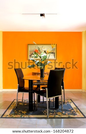 Dining Room On Orange Wall Background