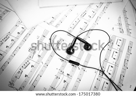 earphone on music sheet look like heart