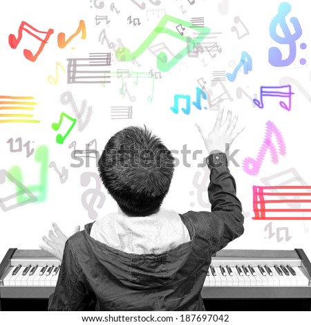 back of musician composing the music note on the imagination , B&W processed human and piano