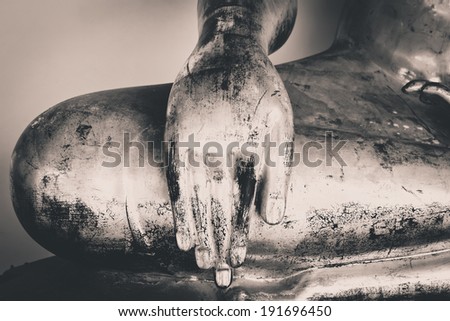 Old Golden Buddha Statue Hand, old black and white film processed