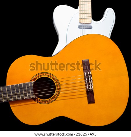 acoustic guitar and white electric guitar, isolated on black