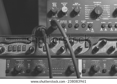 recording studio gears close up , black and white processed