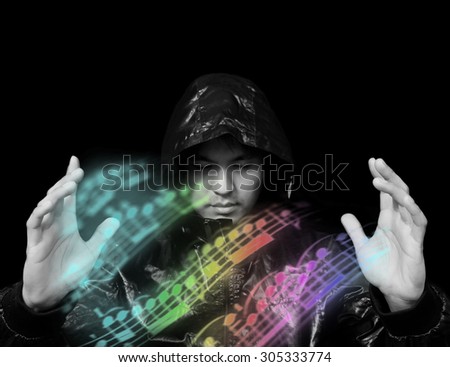 wizard of magic musical technology & colorful floating music note in the imagination , isolated on black. composer / producer / arranger / production / school concept
