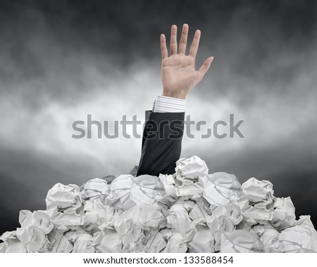 businessman need help from crumpled paper