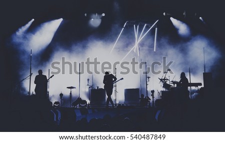 Bands silhouettes on a concert