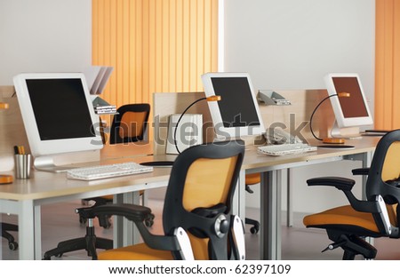 Computers with LCD screens in modern office