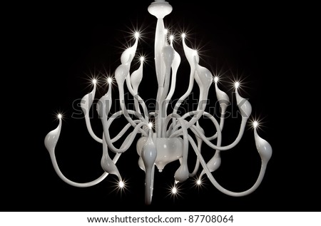 white chandelier isolated on black