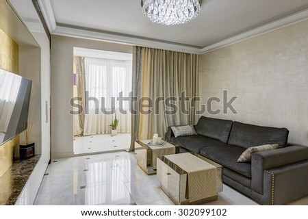 Big and comfortable living room with sofa in luxury mansion