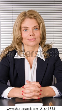 Businesswoman with Daily Planner in office