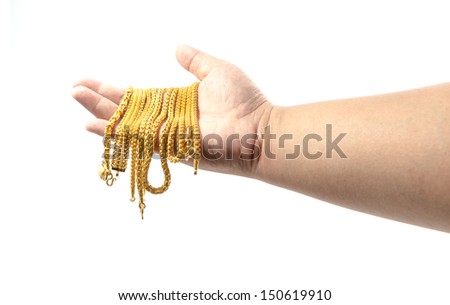Hand Holding Expensive Gold Jewelry on white background