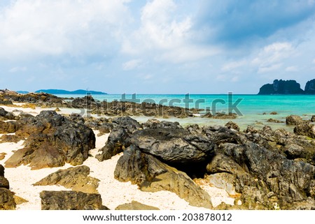 Rocks on the beach in Tropical sea at Bamboo Island Krabi Province Southeast Asia Thailand