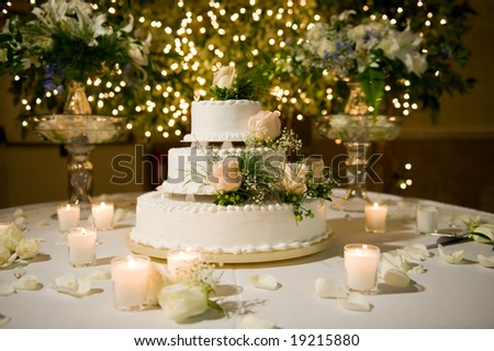 Wedding cake on the decorated table