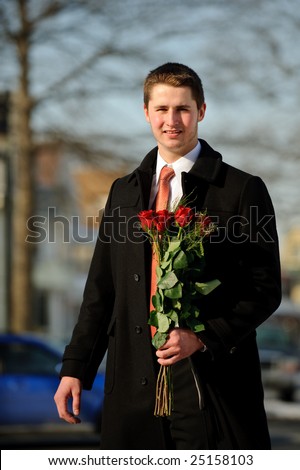 Young man with a bouquet