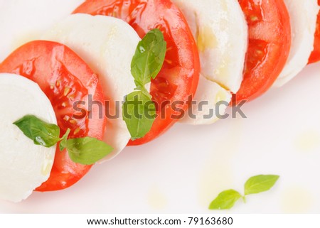 Salad of the slices of the tomato and cheese