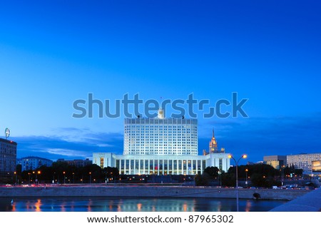 View from the embankment of the Moskva River and White House of Russia behind it at night, Moscow, Russia