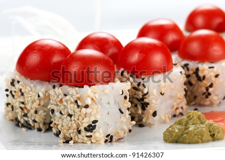 Food photographer, Still Life photographer, Advertising photographer, Professional A diverse selection of delicious Japanese sushi rolls.