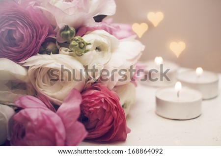 Wedding invitation. Flowers with candles and romantic light