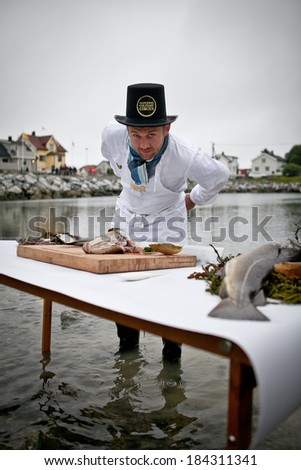 Traena, Norway - July 12 2013: animation, live cooking from The Flying Culinary Circus at the Traenafestival, music festival taking place on the small island of Traena in Norway