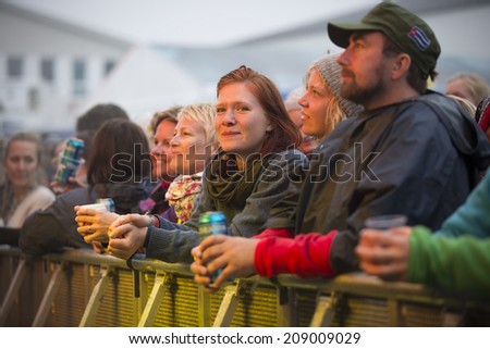 Traena, Norway - July 10 2014: during the concert of the Norwegian folk rock band Hekla Stalstrenga at the Traenafestival, music festival taking place on the small island of Traena