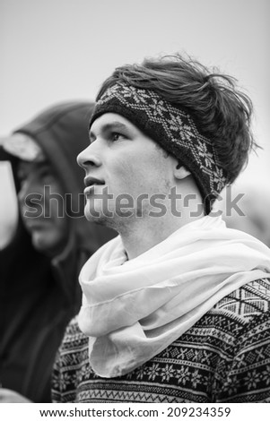 Traena, Norway - July 10 2014: portraits taken during the concert of the Norwegian folk rock band Hekla Stalstrenga at the Traenafestival, music festival taking place on the small island of Traena.