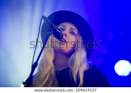 Traena, Norway - July 10 2014: during the concert of the Swedish folk rock band First Aid Kit at the Traenafestival, music festival taking place on the small island of Traena