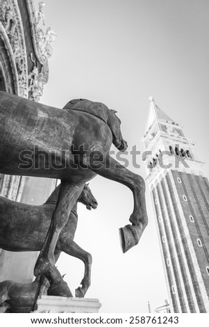 view of the Campanile with the statues of the horses of the San Marco Basilca in front, San Marco Square, Venice, Italy