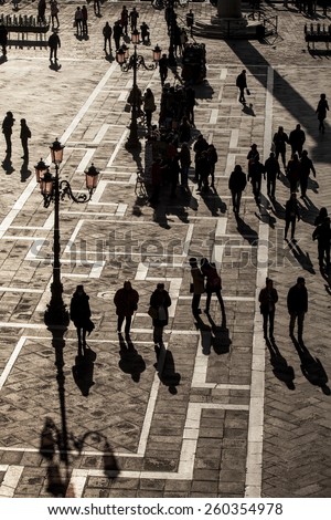 Aerial view of San Marco Piazza (Saint Marc Square): Shadow of tourists on the square