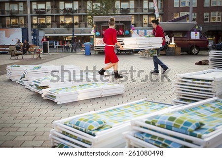 Amsterdam, The Netherlands, 12 September 2014, at West\'ival, a free open air Cinema and culture festival on Mercatorplein. before the screening, preparation, people hanging around
