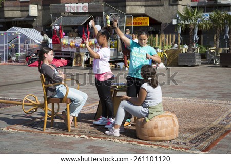 Amsterdam, The Netherlands, 13 September 2014, at West'ival, a free open air Cinema and culture festival on Mercatorplein. slow motion workshop for children