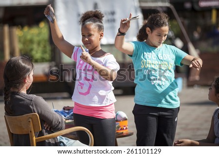 Amsterdam, The Netherlands, 13 September 2014, at West\'ival, a free open air Cinema and culture festival on Mercatorplein. slow motion workshop for children